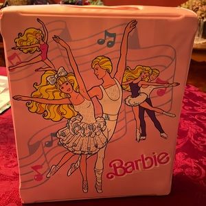 Barbie case with drop down table and seats and closet.